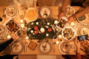 holiday meal spread out on table with healthy options for staying fit during the holidays